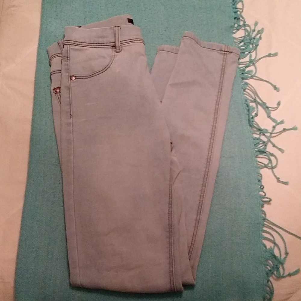 Pale blue skinny jeans
